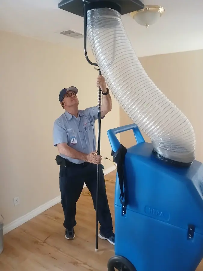 HVAC Installation technician using HEPA equipment in Paradise